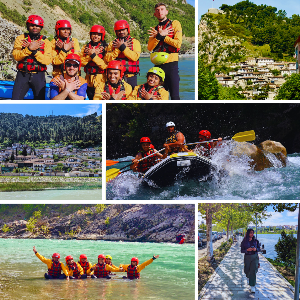 A group of friends in rafting gear posing together by the river in Albania.