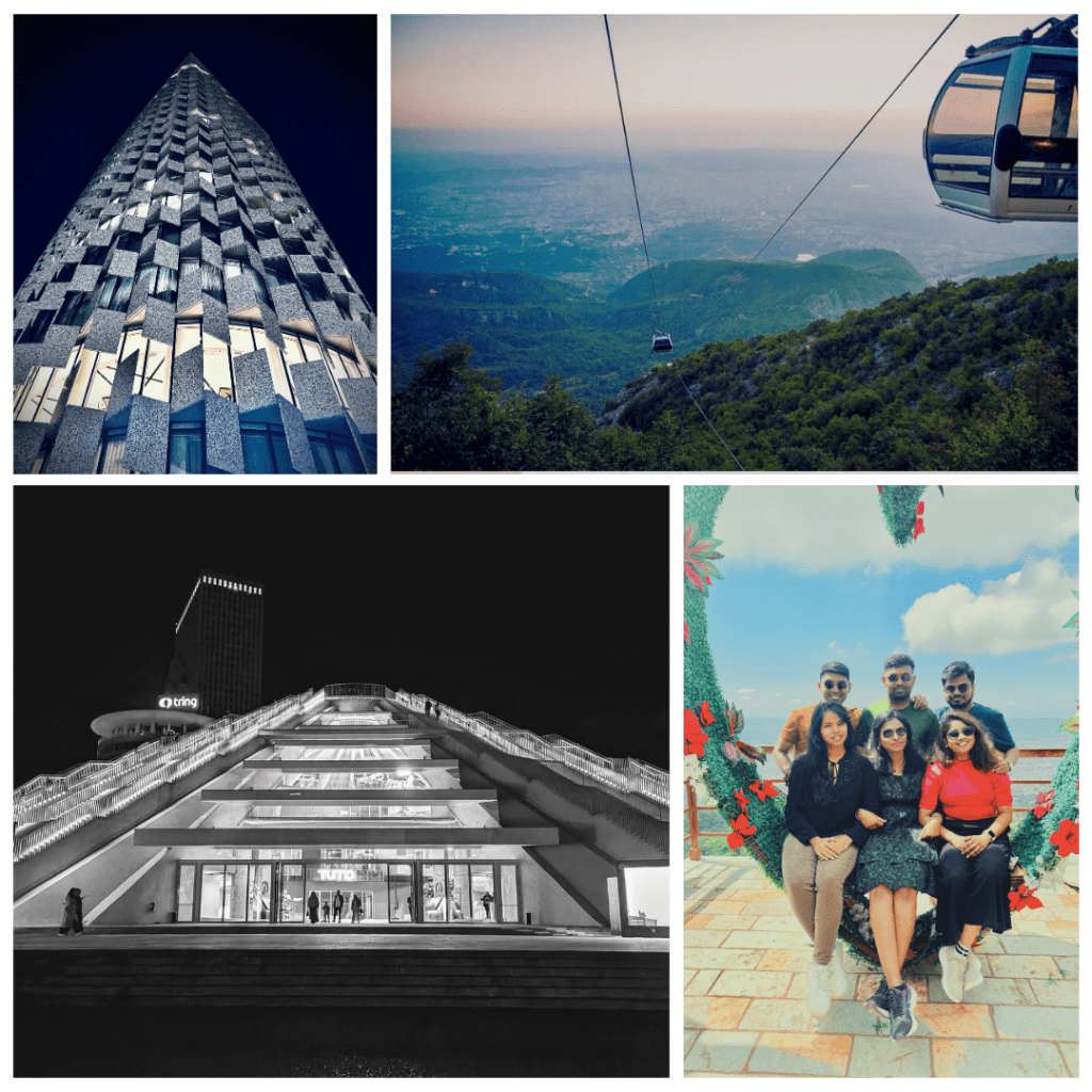 A tall, modern building with a textured façade, reflecting light against a dark sky.